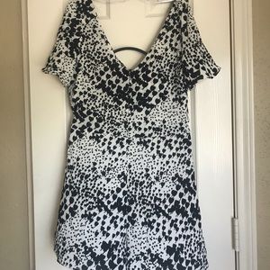 NWT Zara v neck tie back romper in animal print .